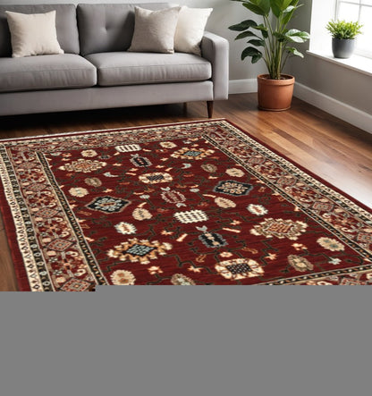 5' X 8' Red And Black Oriental Power Loom Area Rug With Fringe