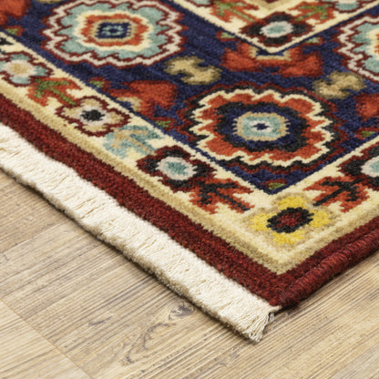 2' X 3' Red Ivory Blue And Orange Oriental Power Loom Stain Resistant Area Rug With Fringe