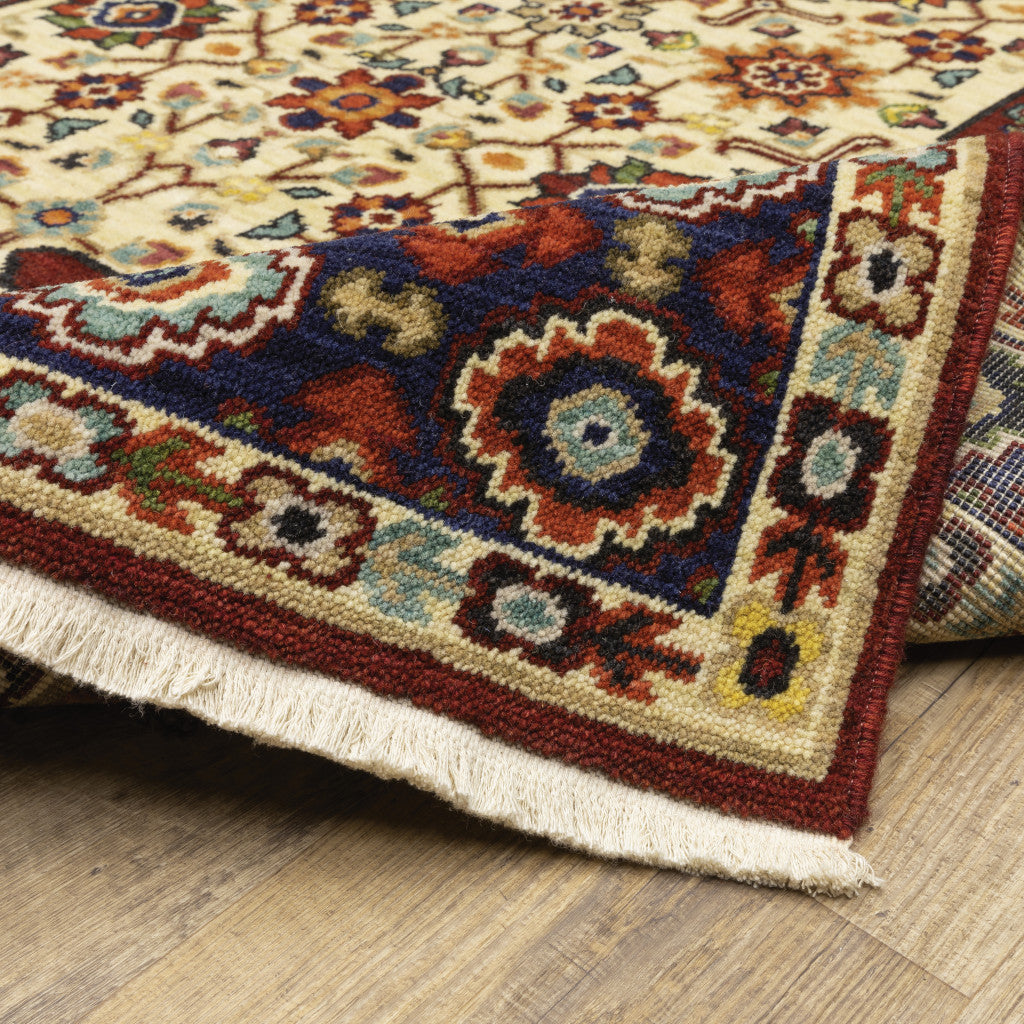 2' X 3' Red Ivory Blue And Orange Oriental Power Loom Stain Resistant Area Rug With Fringe