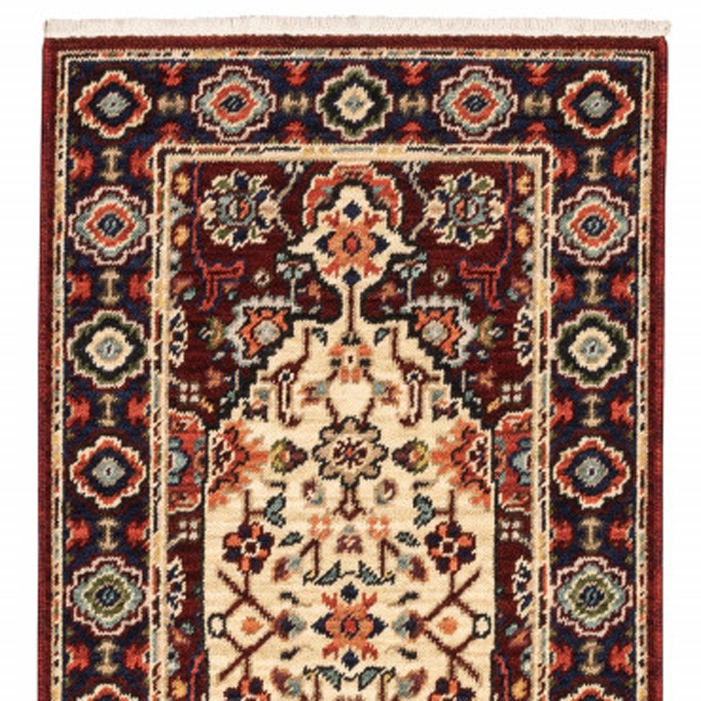 2' X 6' Red Ivory Blue And Orange Oriental Power Loom Stain Resistant Runner Rug With Fringe