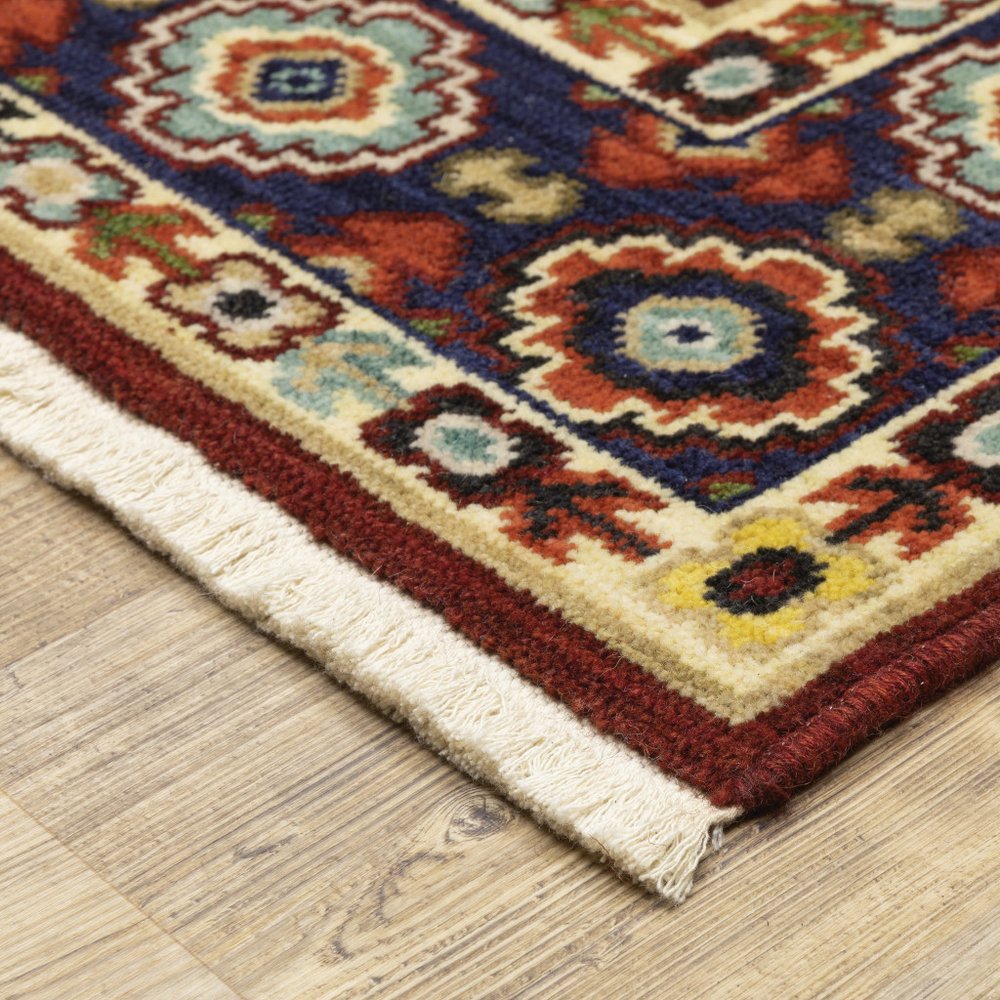 2' X 6' Red Ivory Blue And Orange Oriental Power Loom Stain Resistant Runner Rug With Fringe