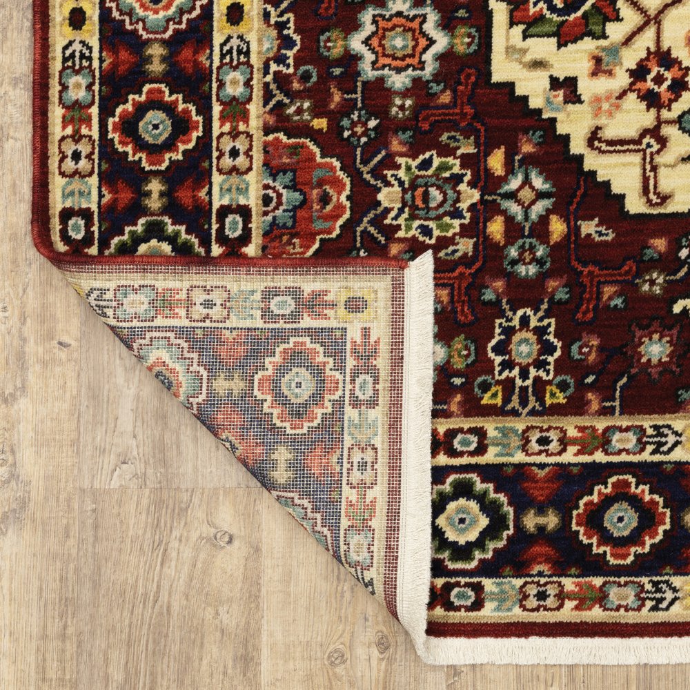 2' X 6' Red Ivory Blue And Orange Oriental Power Loom Stain Resistant Runner Rug With Fringe
