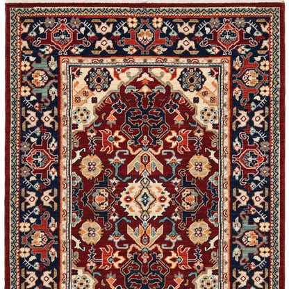 5' X 8' Red Blue Orange And Beige Oriental Power Loom Stain Resistant Area Rug With Fringe