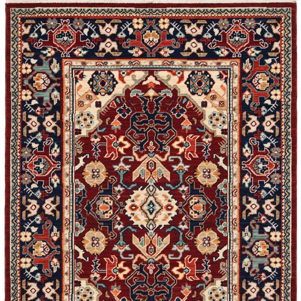 5' X 8' Red Blue Orange And Beige Oriental Power Loom Stain Resistant Area Rug With Fringe