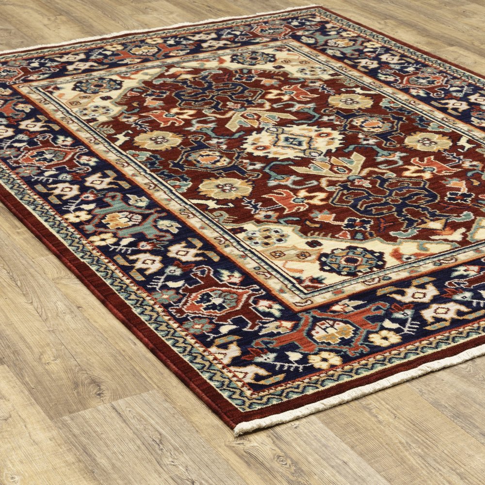 5' X 8' Red Blue Orange And Beige Oriental Power Loom Stain Resistant Area Rug With Fringe