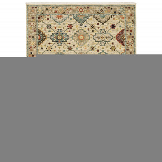 2' X 3' Beige Pale Blue Rust Gold Tan Brown And Orange Oriental Power Loom Stain Resistant Area Rug With Fringe