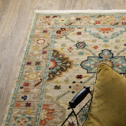 2' X 3' Beige Pale Blue Rust Gold Tan Brown And Orange Oriental Power Loom Stain Resistant Area Rug With Fringe