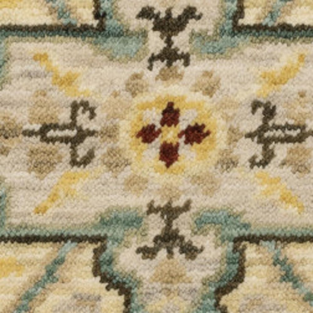 2' X 6' Beige Pale Blue Rust Gold Tan Brown And Orange Oriental Power Loom Stain Resistant Runner Rug With Fringe