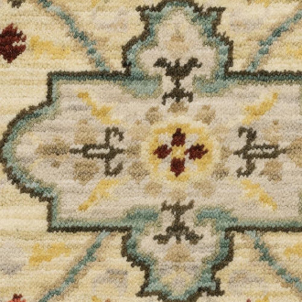 2' X 6' Beige Pale Blue Rust Gold Tan Brown And Orange Oriental Power Loom Stain Resistant Runner Rug With Fringe