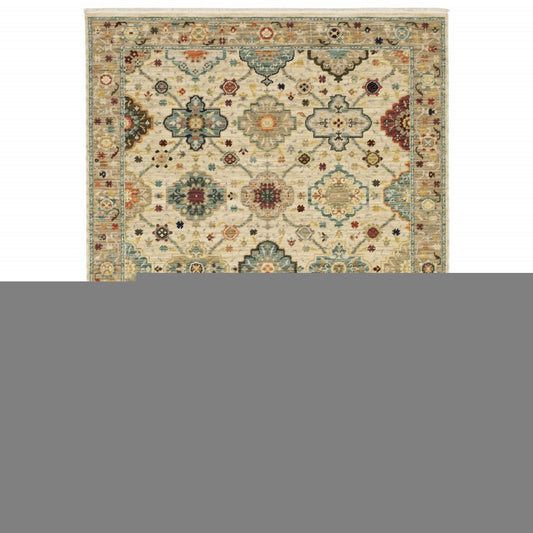 8' X 11' Beige Pale Blue Rust Gold Tan Brown And Orange Oriental Power Loom Stain Resistant Area Rug With Fringe
