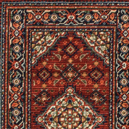 2' X 6' Red Blue Ivory And Orange Oriental Power Loom Stain Resistant Runner Rug With Fringe