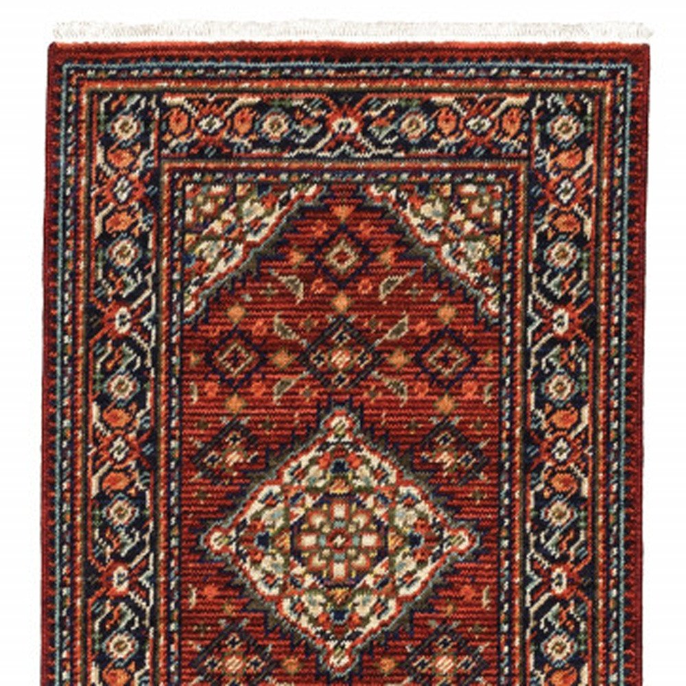 2' X 6' Red Blue Ivory And Orange Oriental Power Loom Stain Resistant Runner Rug With Fringe