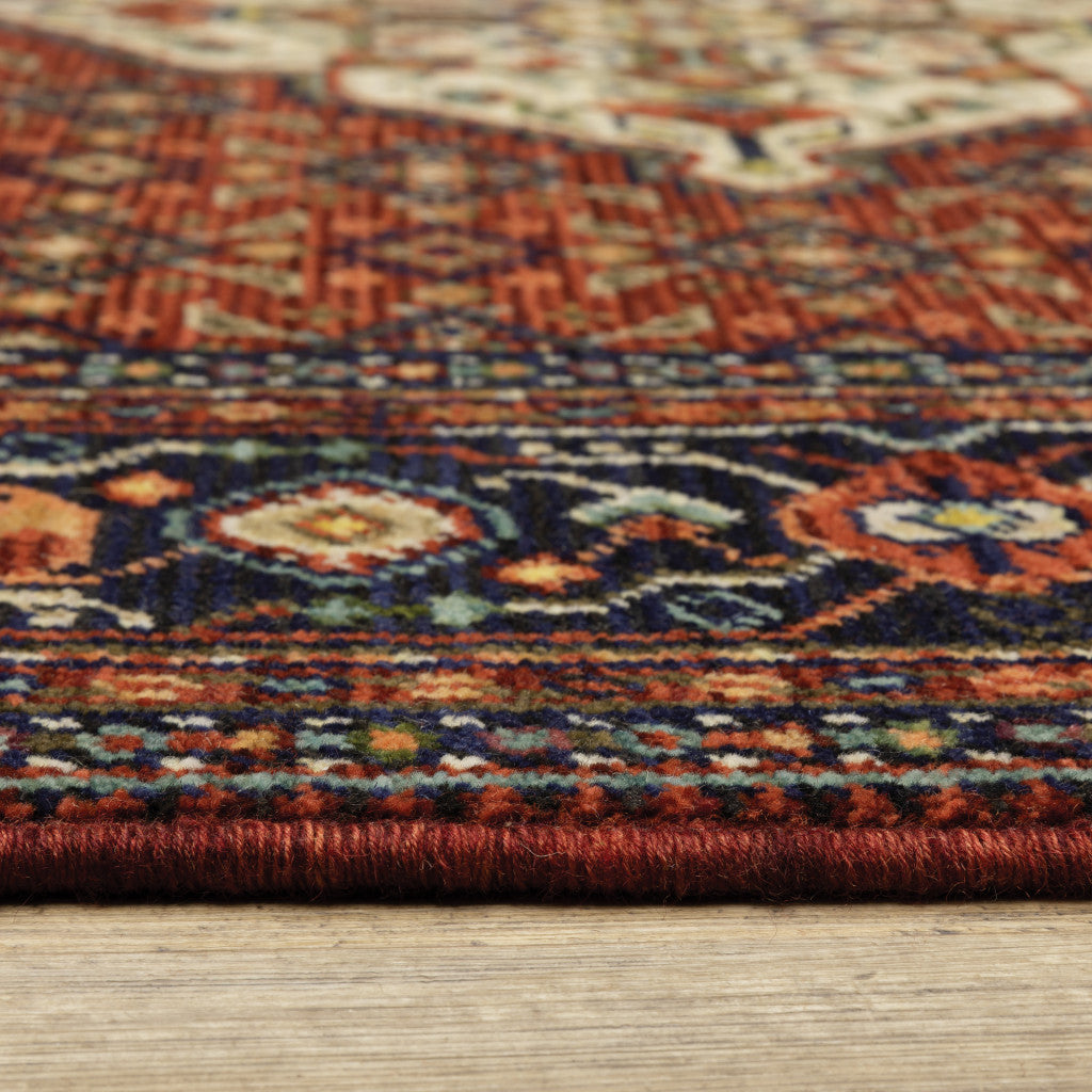 2' X 6' Red Blue Ivory And Orange Oriental Power Loom Stain Resistant Runner Rug With Fringe