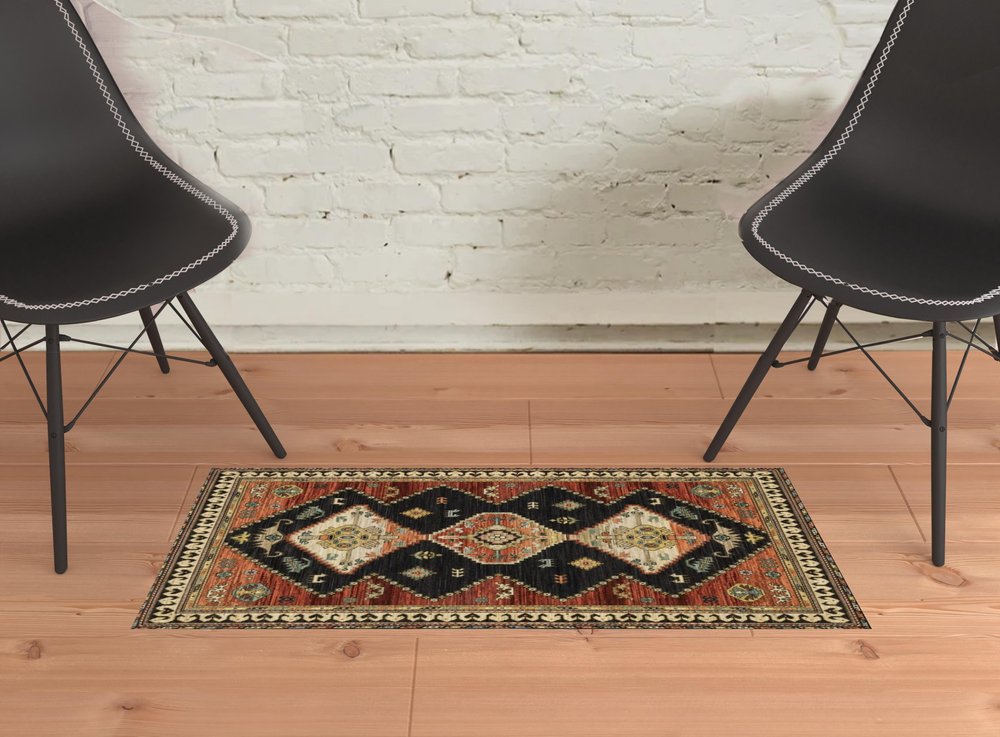 2' X 3' Charcoal Brown Orange Salmon Gold Navy Ivory And Pale Blue Oriental Power Loom Stain Resistant Area Rug With Fringe