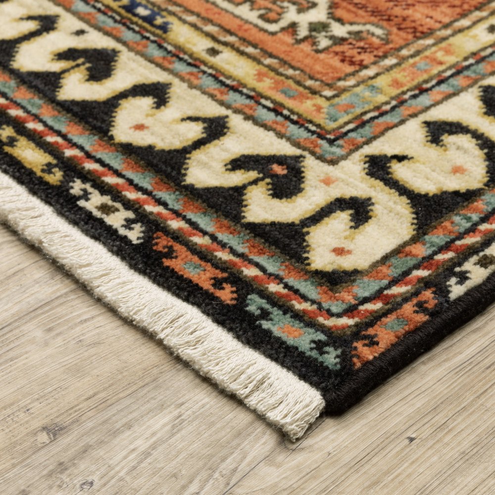 2' X 3' Charcoal Brown Orange Salmon Gold Navy Ivory And Pale Blue Oriental Power Loom Stain Resistant Area Rug With Fringe