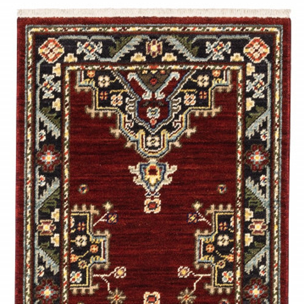2' X 6' Red Black Beige And Blue Oriental Power Loom Stain Resistant Runner Rug With Fringe