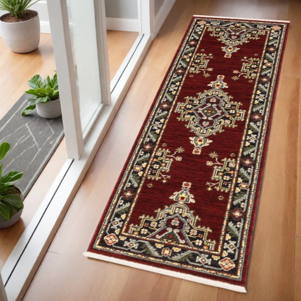 2' X 6' Red Black Beige And Blue Oriental Power Loom Stain Resistant Runner Rug With Fringe