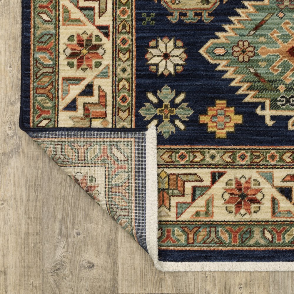 5' X 8' Blue and Beige Oriental Power Loom Area Rug With Fringe