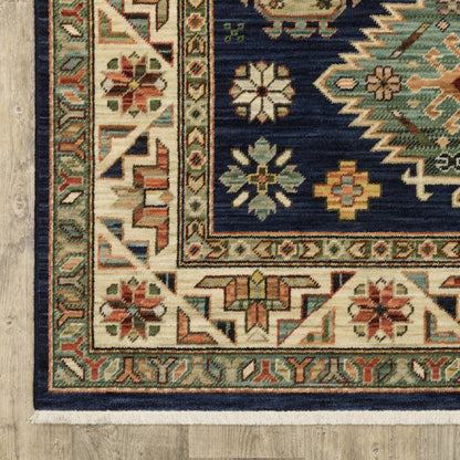 5' X 8' Blue and Beige Oriental Power Loom Area Rug With Fringe