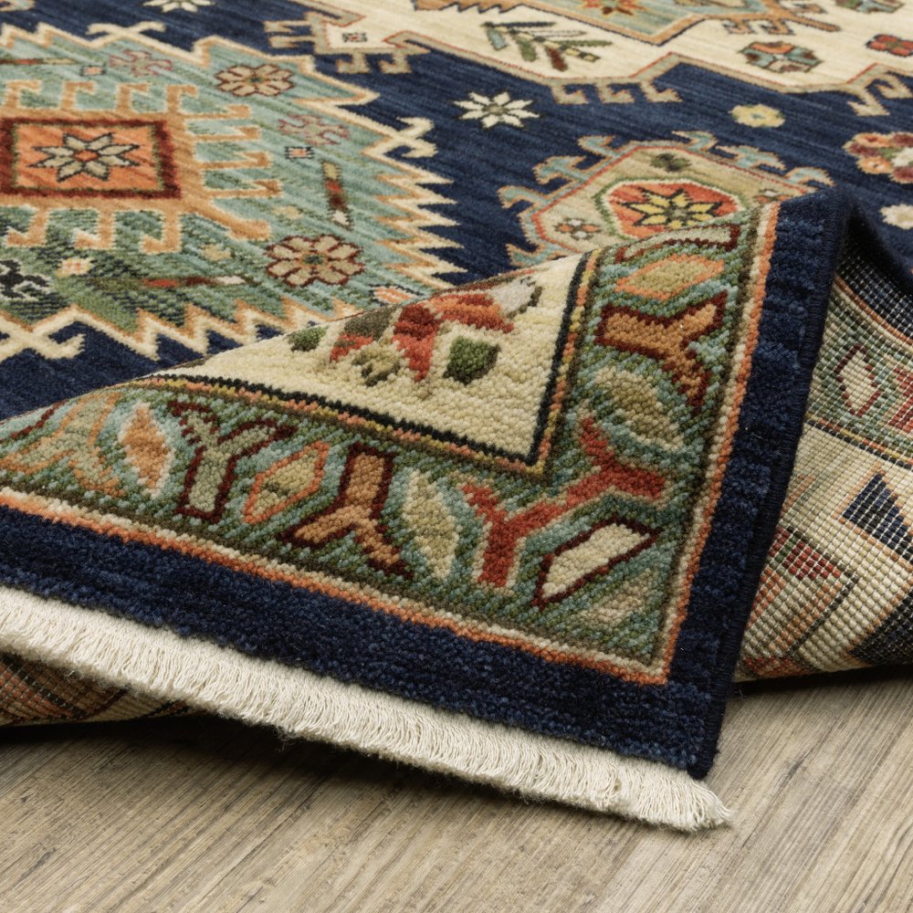 5' X 8' Blue and Beige Oriental Power Loom Area Rug With Fringe