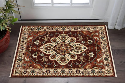 2' X 3' Red Ivory Orange And Blue Oriental Power Loom Stain Resistant Area Rug With Fringe