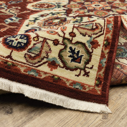 3' X 5' Red Ivory Orange And Blue Oriental Power Loom Stain Resistant Area Rug With Fringe