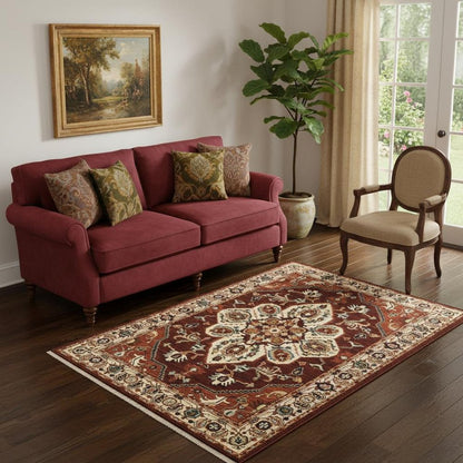5' X 8' Red Ivory Orange And Blue Oriental Power Loom Stain Resistant Area Rug With Fringe