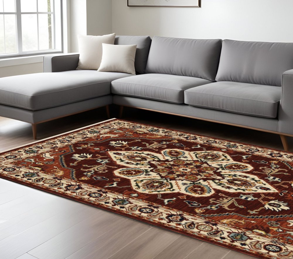7' X 10' Red And Ivory Oriental Area Rug With Fringe