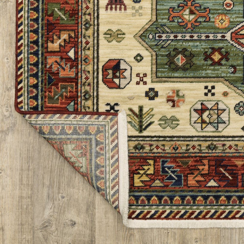 5' X 8' Red Blue And Beige Oriental Area Rug With Fringe