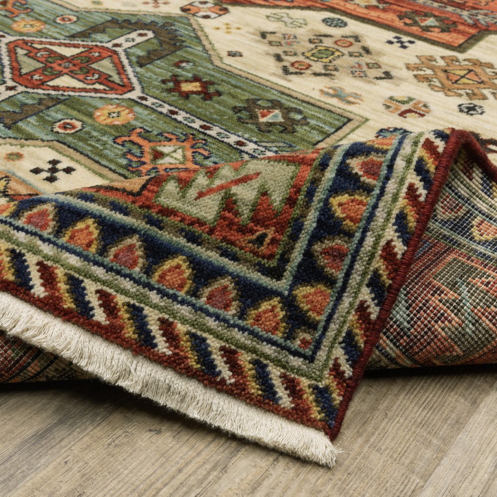 5' X 8' Red Blue And Beige Oriental Area Rug With Fringe