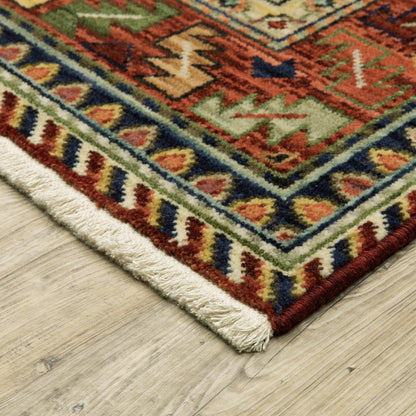6' X 9' Brick Red Orange Rust Beige Gold Pale Blue Olive Navy And Black Oriental Power Loom Stain Resistant Area Rug With Fringe