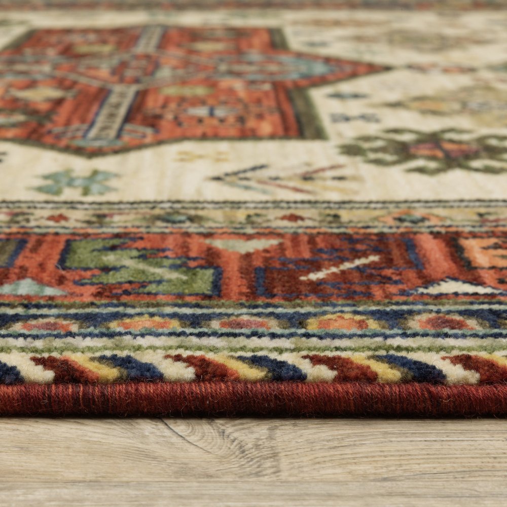 6' X 9' Brick Red Orange Rust Beige Gold Pale Blue Olive Navy And Black Oriental Power Loom Stain Resistant Area Rug With Fringe