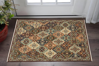 2' X 3' Red Rust Navy Light Blue Brown Orange Ivory And Gold Oriental Power Loom Stain Resistant Area Rug With Fringe