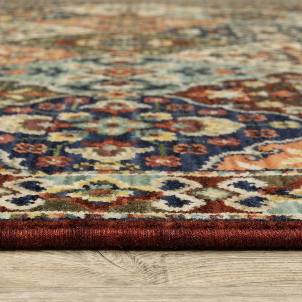 2' X 3' Red Rust Navy Light Blue Brown Orange Ivory And Gold Oriental Power Loom Stain Resistant Area Rug With Fringe