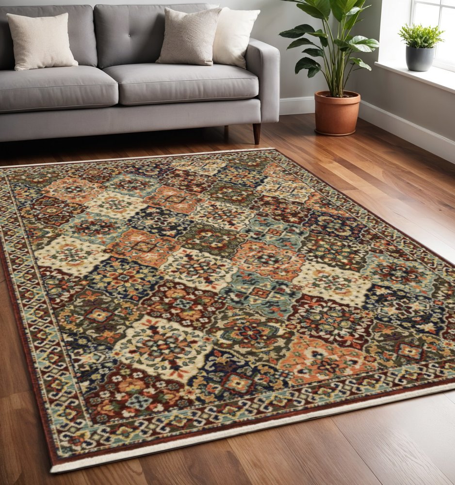 5' X 8' Red And Ivory Oriental Area Rug With Fringe