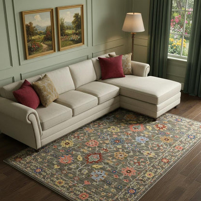 6' X 9' Grey Salmon Pink Gold Blue Rust Deep Blue Ivory And Green Oriental Power Loom Stain Resistant Area Rug With Fringe