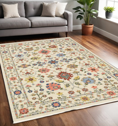 5' X 8' Ivory Blue And Red Oriental Area Rug With Fringe