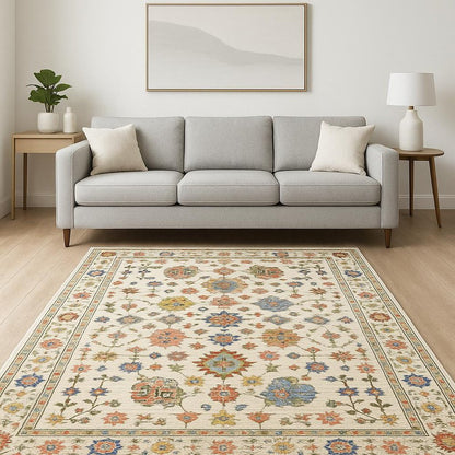 6' X 9' Ivory Salmon Pink Gold Blues Grey Rust And Green Oriental Power Loom Stain Resistant Area Rug With Fringe