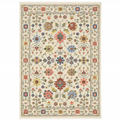 6' X 9' Ivory Salmon Pink Gold Blues Grey Rust And Green Oriental Power Loom Stain Resistant Area Rug With Fringe
