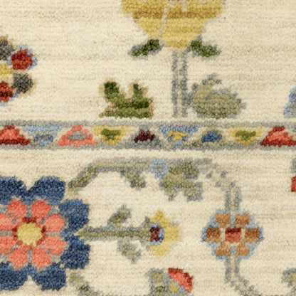 6' X 9' Ivory Salmon Pink Gold Blues Grey Rust And Green Oriental Power Loom Stain Resistant Area Rug With Fringe