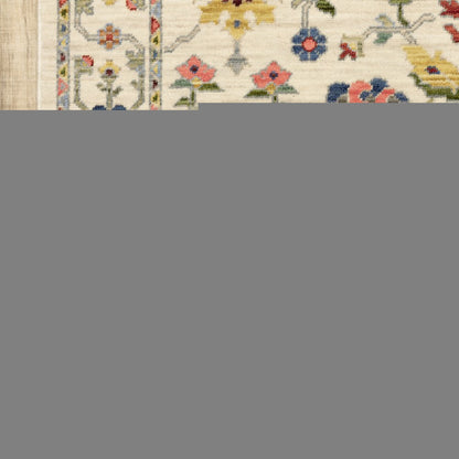 8' X 11' Ivory Salmon Pink Gold Blues Grey Rust And Green Oriental Power Loom Stain Resistant Area Rug With Fringe
