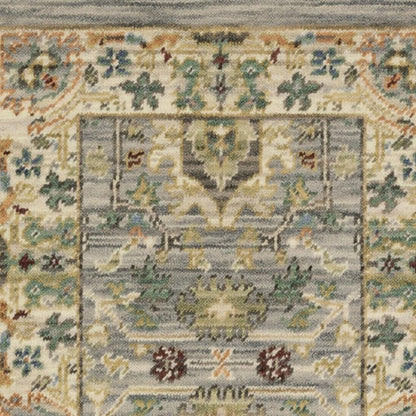 2' X 6' Grey Ivory Orange Teal Green Charcoal Blue And Red Oriental Power Loom Stain Resistant Runner Rug With Fringe