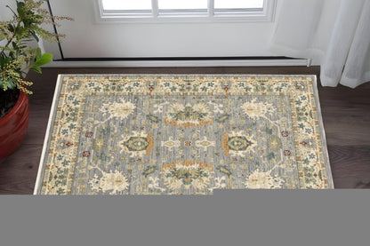 3' X 5' Grey Ivory Orange Teal Green Charcoal Blue And Red Oriental Power Loom Stain Resistant Area Rug With Fringe