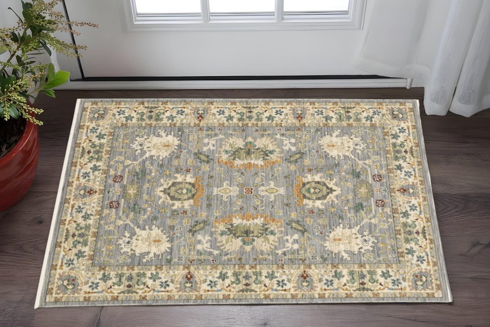 3' X 5' Grey Ivory Orange Teal Green Charcoal Blue And Red Oriental Power Loom Stain Resistant Area Rug With Fringe