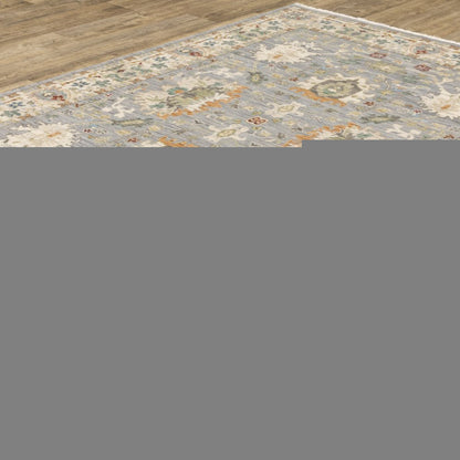3' X 5' Grey Ivory Orange Teal Green Charcoal Blue And Red Oriental Power Loom Stain Resistant Area Rug With Fringe