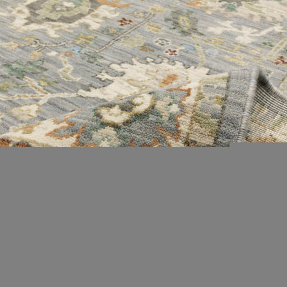 3' X 5' Grey Ivory Orange Teal Green Charcoal Blue And Red Oriental Power Loom Stain Resistant Area Rug With Fringe