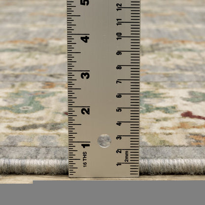 5' X 8' Blue And Ivory Oriental Power Loom Stain Resistant Area Rug With Fringe