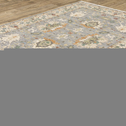 6' X 9' Grey Ivory Orange Teal Green Charcoal Blue And Red Oriental Power Loom Stain Resistant Area Rug With Fringe