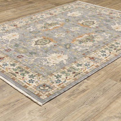 8' X 11' Grey Ivory Orange Teal Green Charcoal Blue And Red Oriental Power Loom Stain Resistant Area Rug With Fringe
