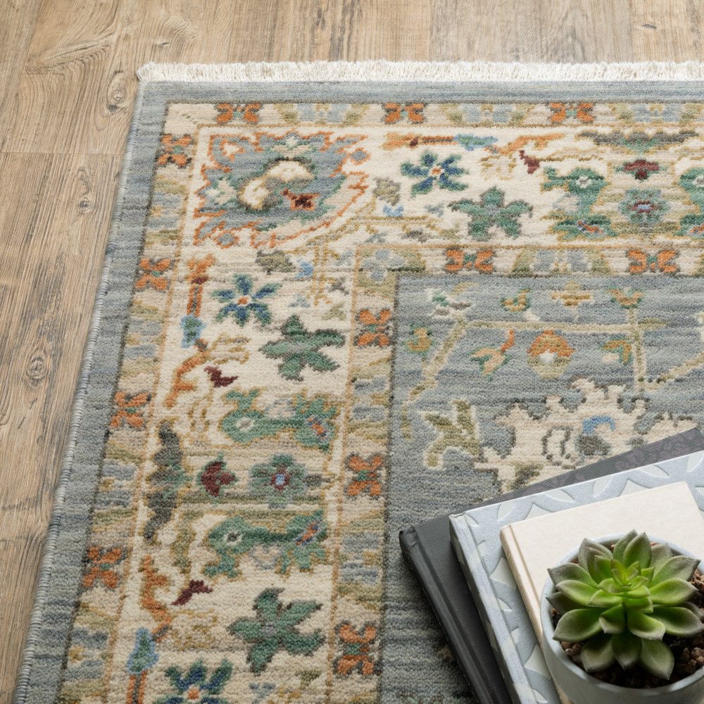 8' X 11' Grey Ivory Orange Teal Green Charcoal Blue And Red Oriental Power Loom Stain Resistant Area Rug With Fringe
